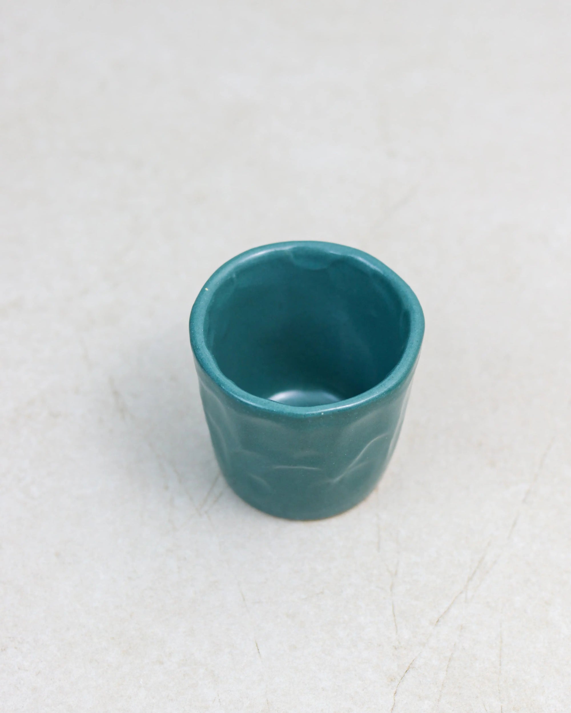 Faceted coffee cup - ceramic in teal green
